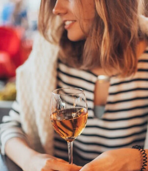 woman with a glass of wine